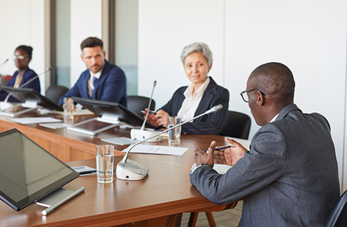 lawyer leading board meeting